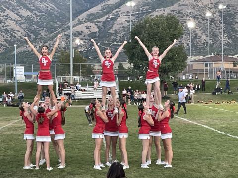 Our 8th grade cheer squad rallies the team every week! 