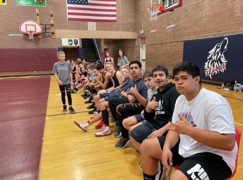 Wrestlers sitting on the bench