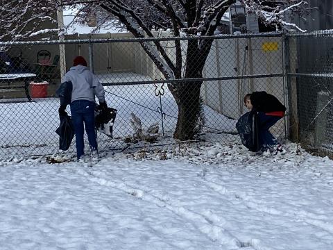 Picking up trash in the snow