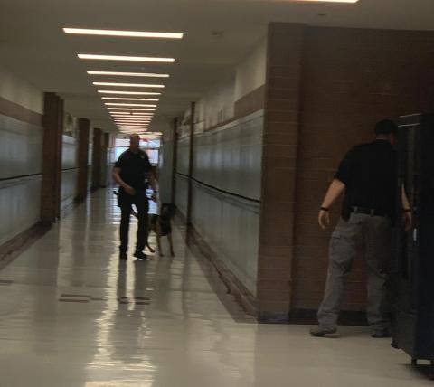 Officers checking the hallways