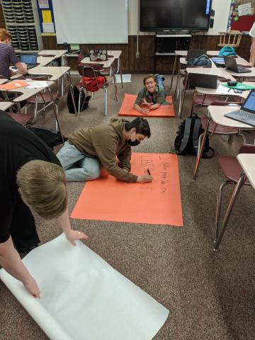 More students working on posters