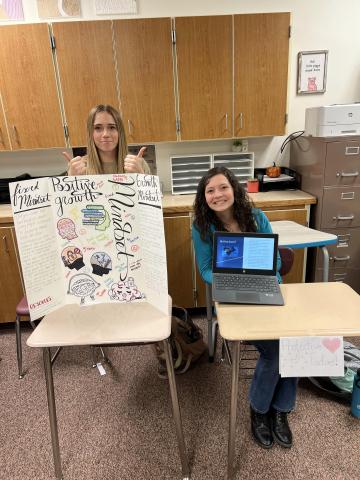 Students displaying their work at the mental health awareness fair