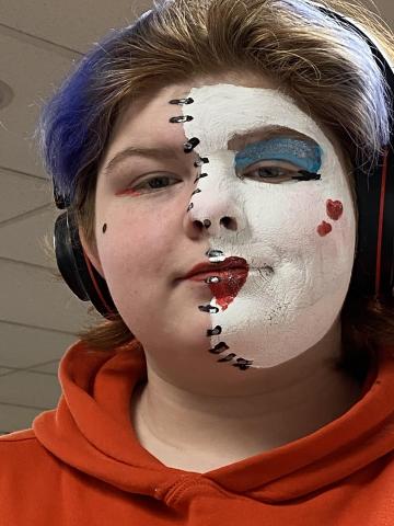 half of the face painted