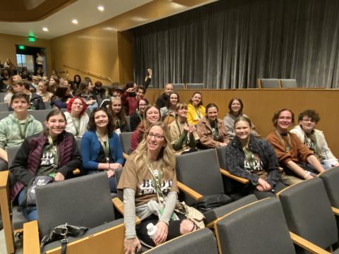 students in a theater at drama con